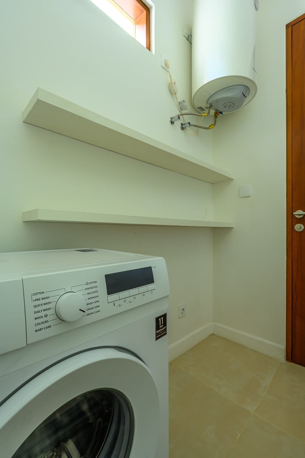 Stylish 2BR Pool Townhouse in Sanur — Laundry area photo 1